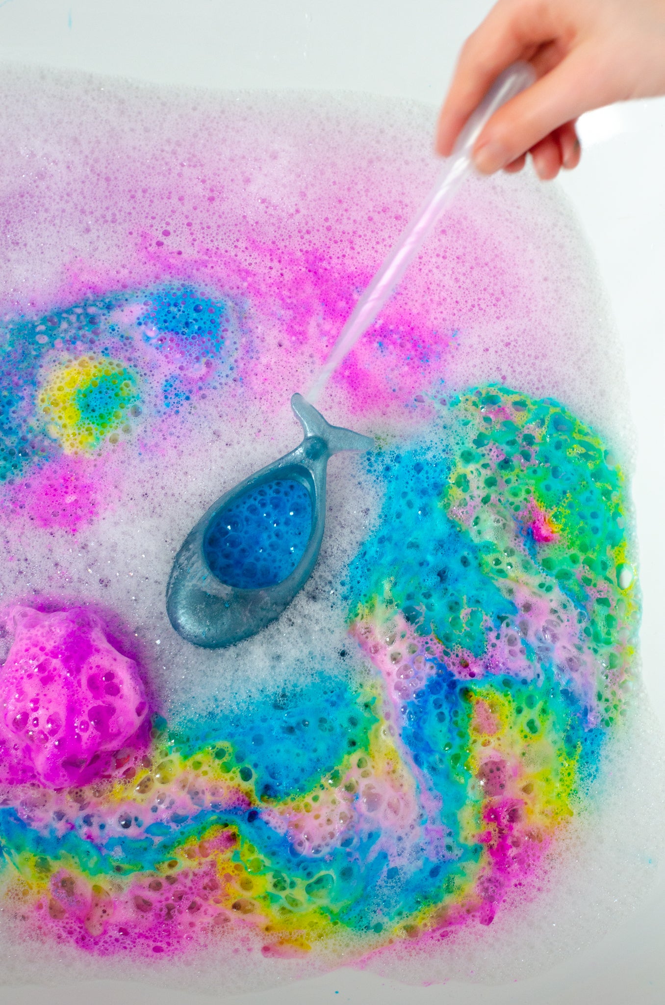 Bright coloured potion play for the bath